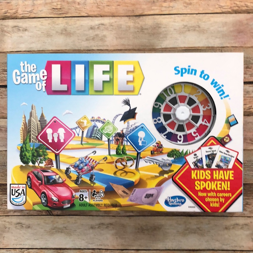 the Game of LIFE Family Board Game | For Ages 8+. 2 to 4 Players